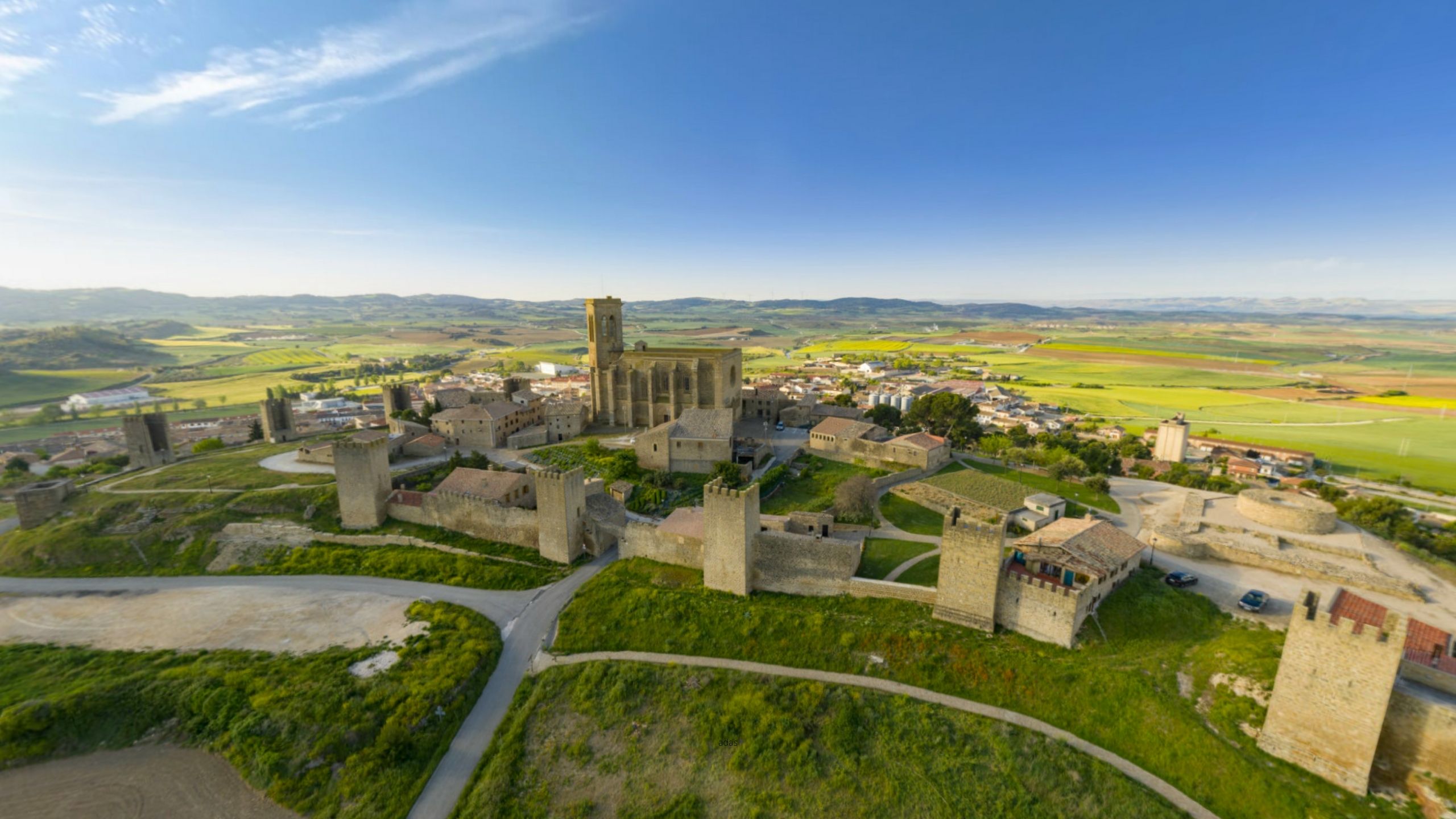 Visit the Fortified Enclosure of Artajona and the Church of San Saturnino.