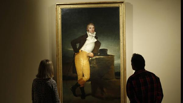 Portrait of the Marqués de San Adrián de Goya from the Museo de Navarra observed by two people