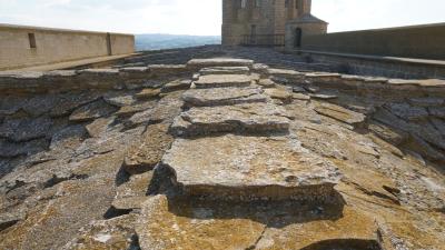 Visit the Fortified Enclosure of Artajona and the Church of San Saturnino.